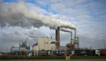 Udledningen af drivhusgasser skal reduceres væsentligt, bl.a. gennem et CO2-kvotehandelssystem